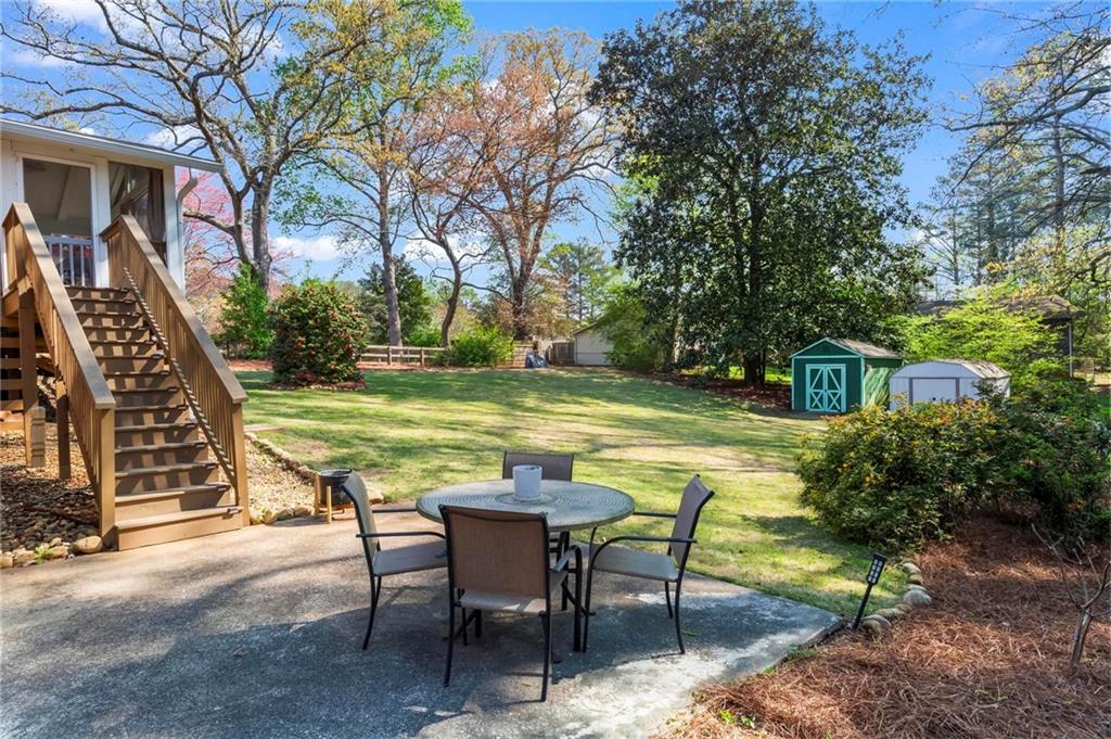 4061 North Cooper Lake Road Southeast Smyrna, GA 30082 - Photo 40 of 45 a view of a swimming pool with a patio