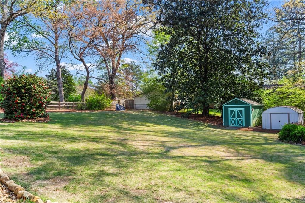 4061 North Cooper Lake Road Southeast Smyrna, GA 30082 - Photo 41 of 45 a view of a trees in front of a house