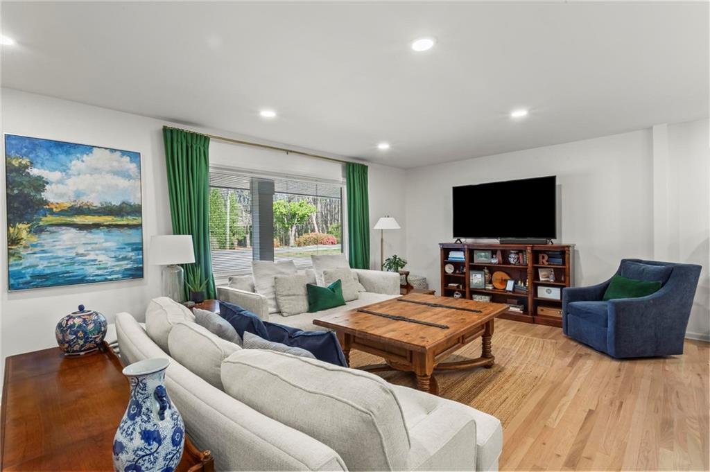 4061 North Cooper Lake Road Southeast Smyrna, GA 30082 - Photo 5 of 45 a living room with furniture and a flat screen tv