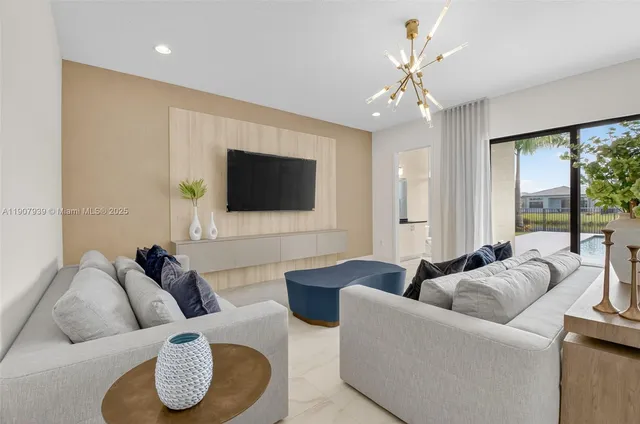 a bedroom with a bed a mirror and a window