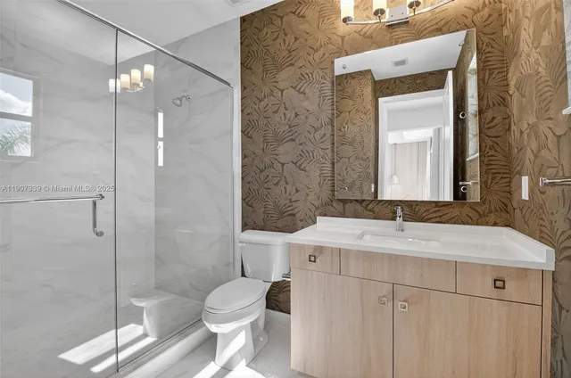 a kitchen with sink a stove and furniture