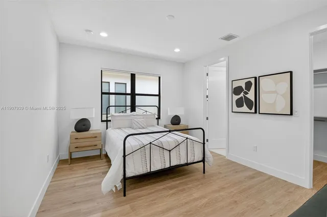 a view of a multi story building with a yard