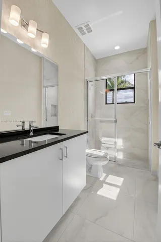a view of a dining area with furniture window and wooden floor
