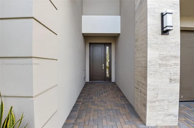 a view of a hallway with entryway