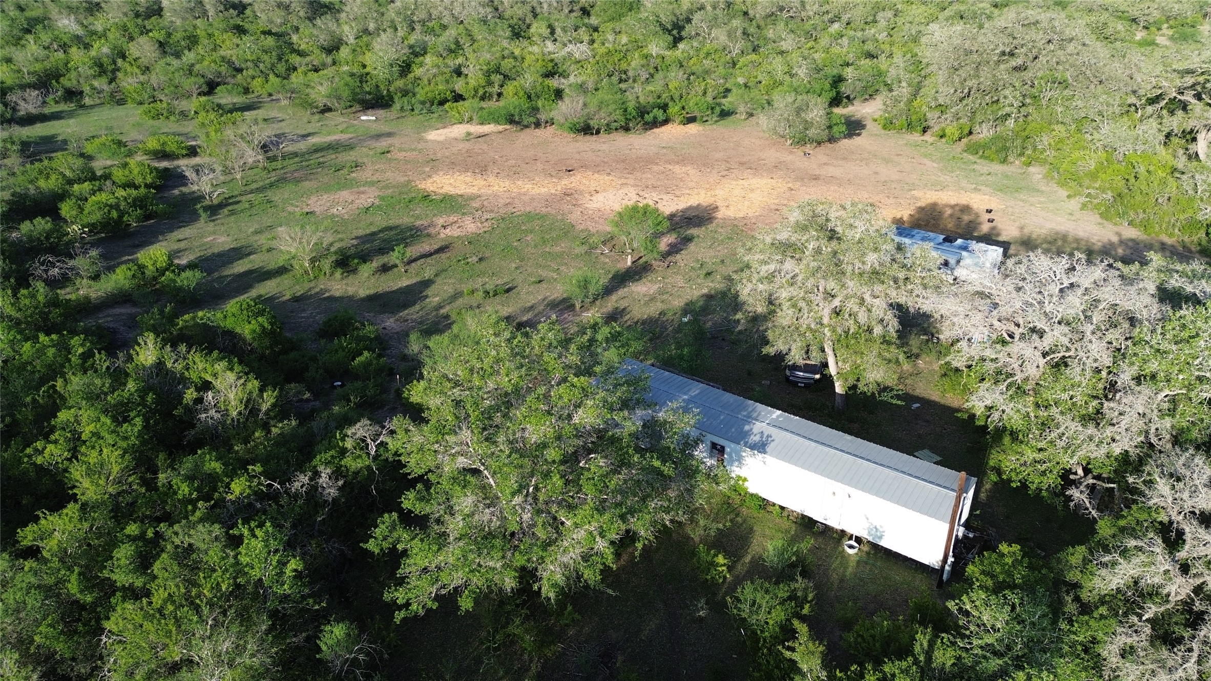 6104 Lucas Road Goliad, TX 77963 - Photo 24 of 32 an aerial view of a house with a yard