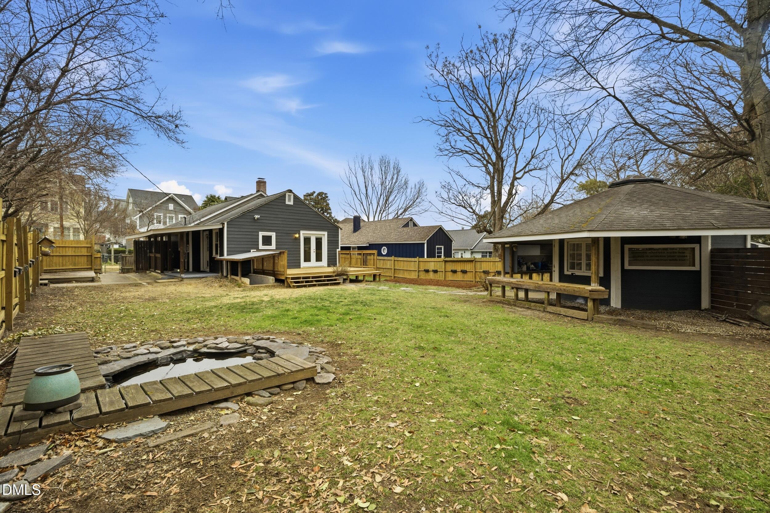 700 Sasser Street Raleigh, NC 27604 - Photo 22 of 25 a front view of a house with a yard