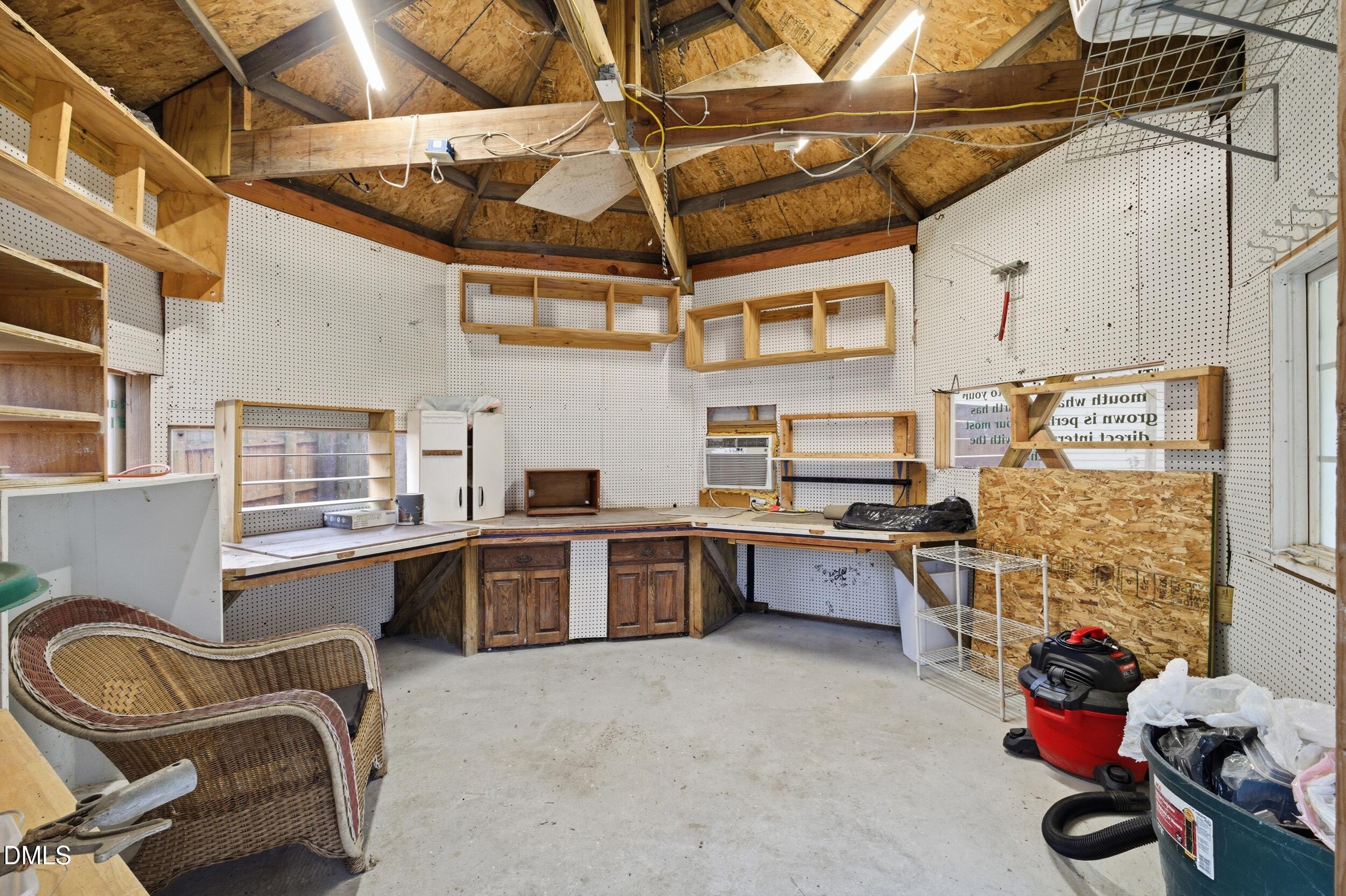 700 Sasser Street Raleigh, NC 27604 - Photo 23 of 25 a kitchen with stainless steel appliances granite countertop a sink and cabinets