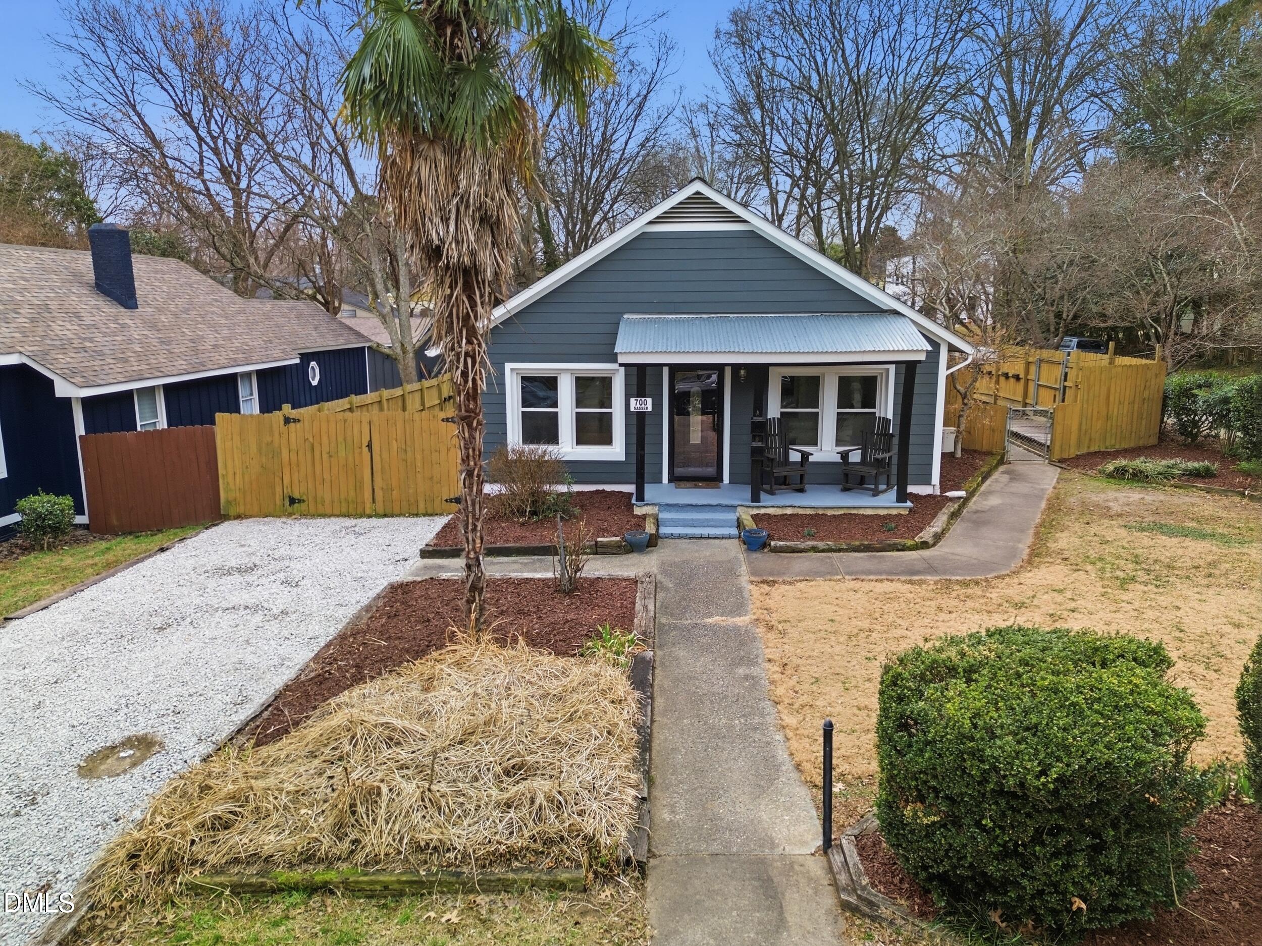 700 Sasser Street Raleigh, NC 27604 - Photo 2 of 25 front view of a house with a yard