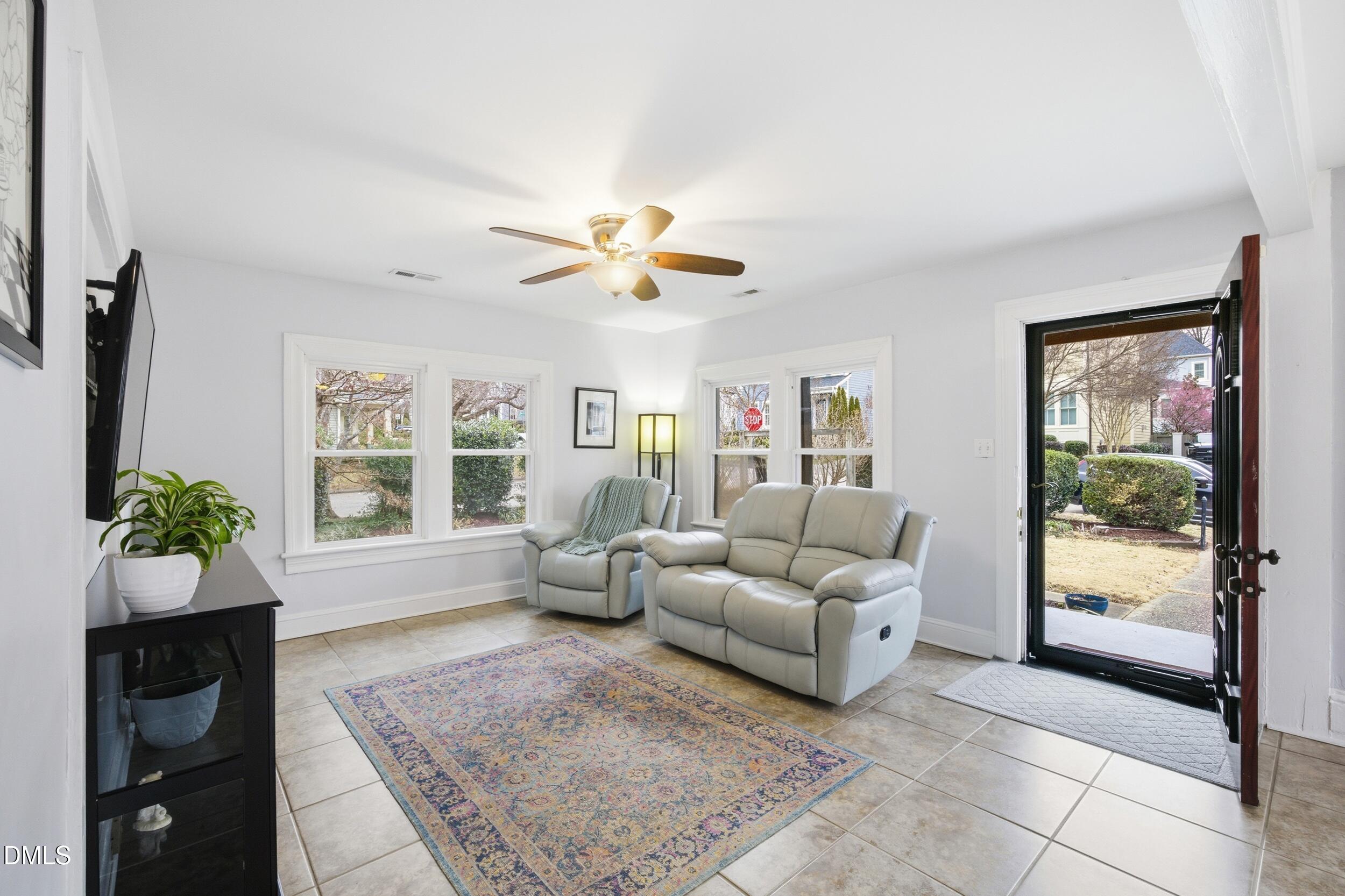 700 Sasser Street Raleigh, NC 27604 - Photo 7 of 25 a living room with furniture and a large window