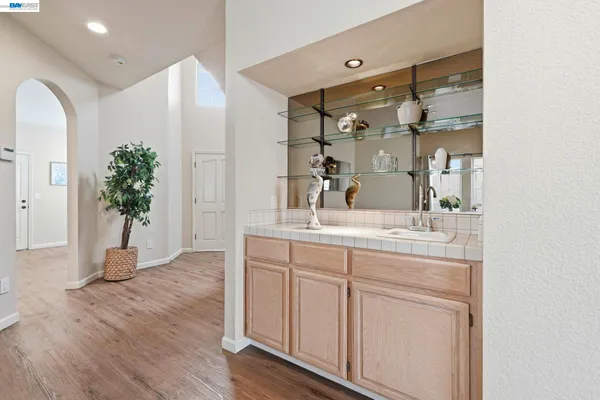 a bathroom with a sink and a mirror