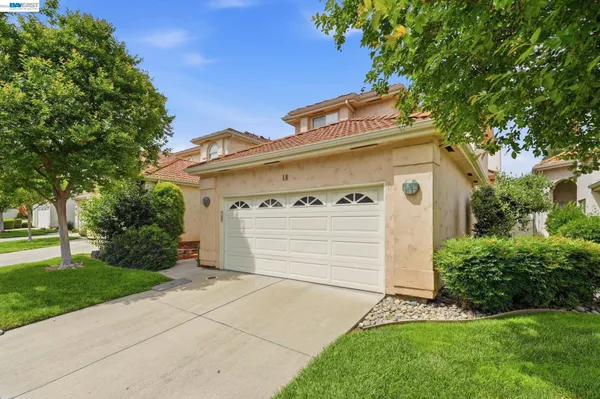 a view of a house with a garage
