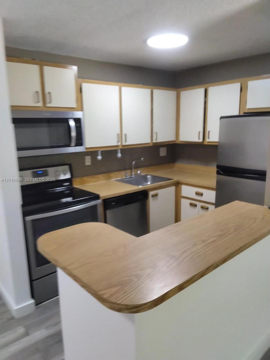 15530 Southwest 80th Street, Unit C306 Miami, FL 33193 - Photo 3 of 14