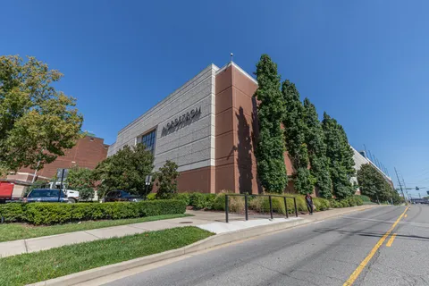 a street view with tall buildings