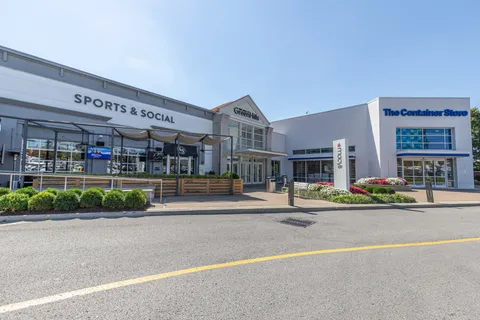 a car parked in front of garage