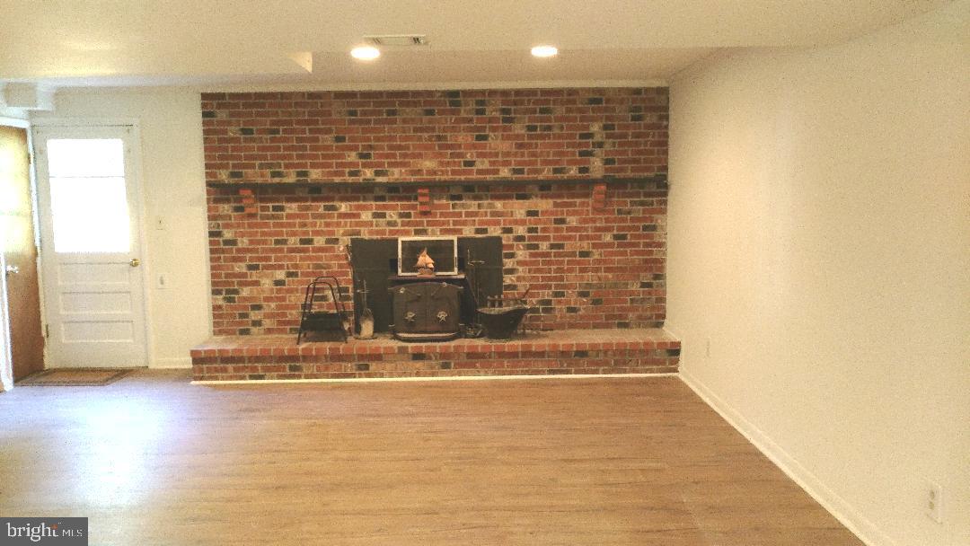 3003 Andover Road Forest Hill, MD 21050 - Photo 16 of 20 Family room with fireplace/wood stove insert.