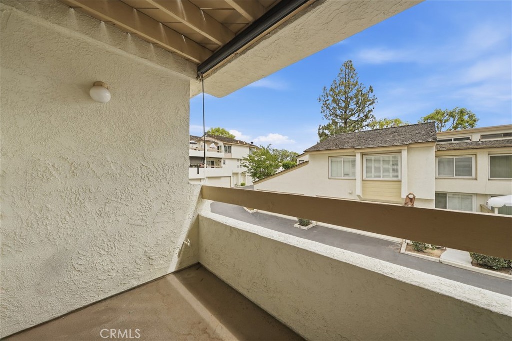 259 Scenic Way Brea, CA 92821 - Photo 20 of 62 a view of balcony with two potted plants