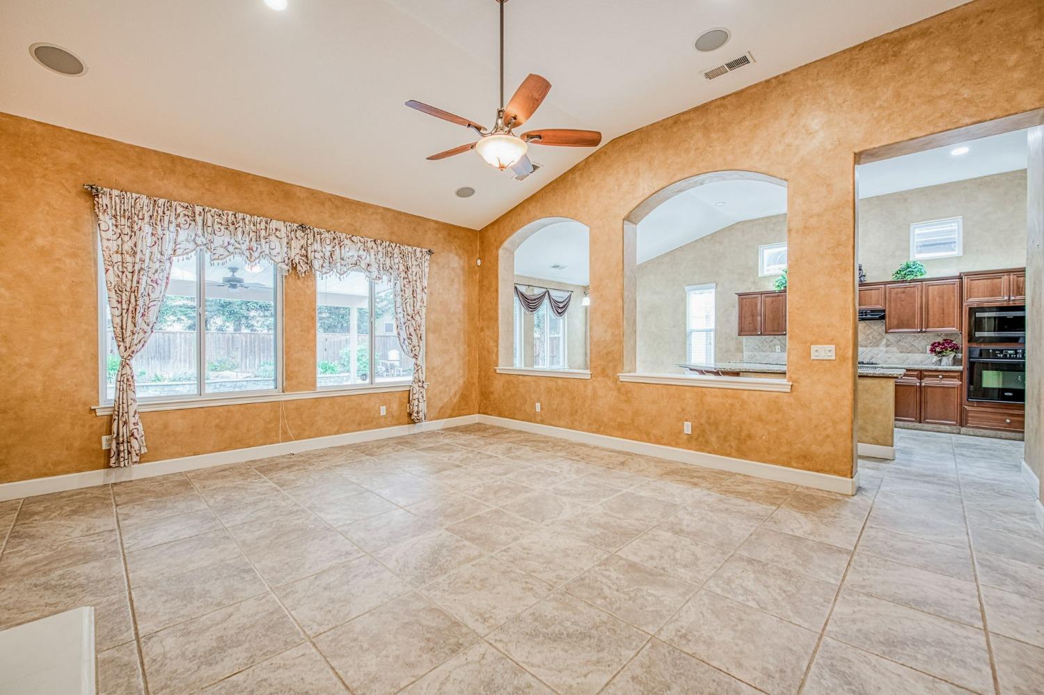 2267 Graybark Avenue Clovis, CA 93619 - Photo 15 of 42 a view of an empty room with a window