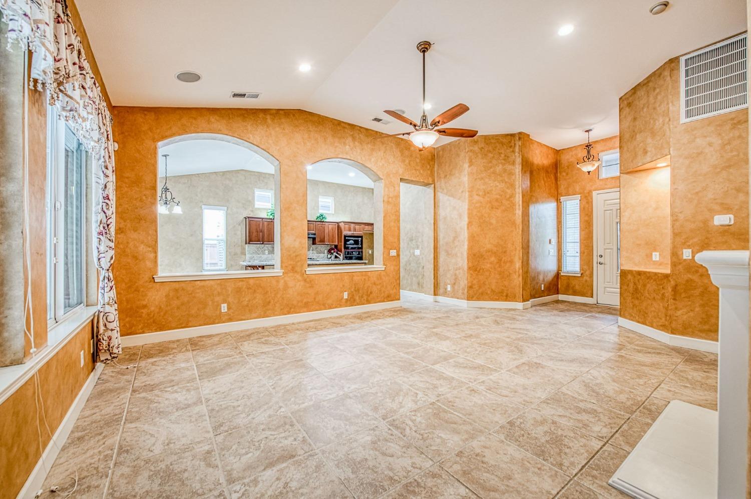 2267 Graybark Avenue Clovis, CA 93619 - Photo 16 of 42 a view of an empty room window and wooden floor