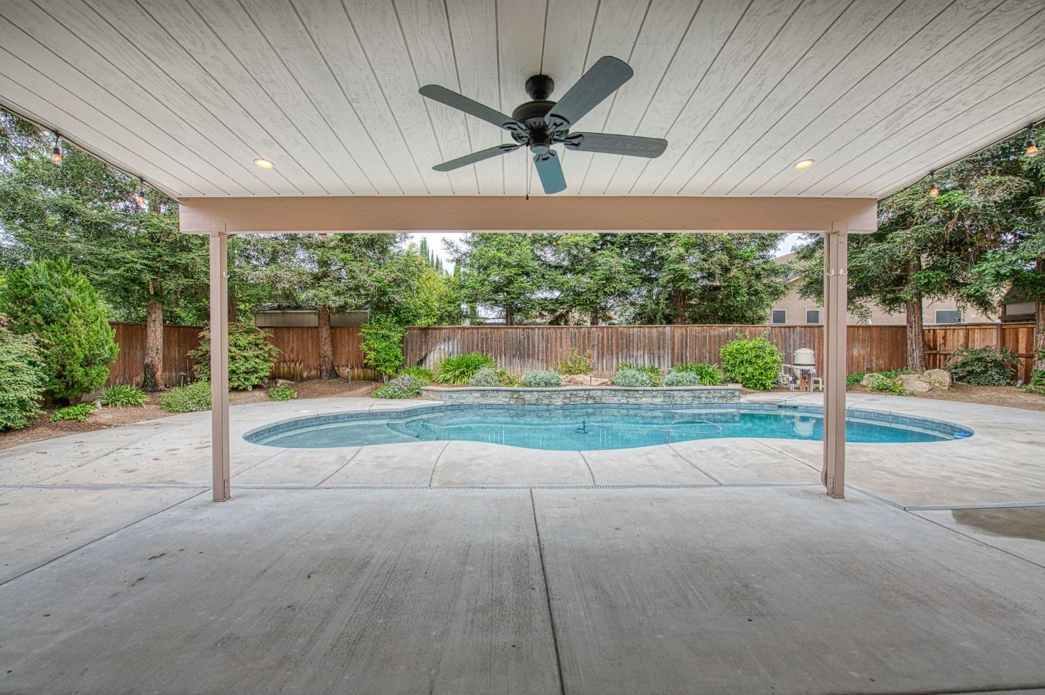 2267 Graybark Avenue Clovis, CA 93619 - Photo 36 of 42 a view of a porch with hardwood