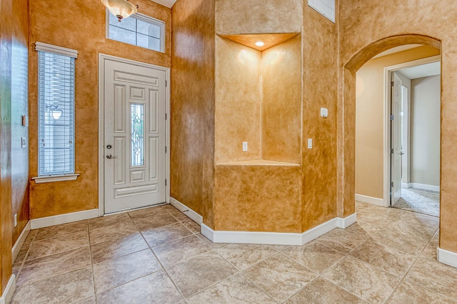 2267 Graybark Avenue Clovis, CA 93619 - Photo 7 of 42 a view of front door