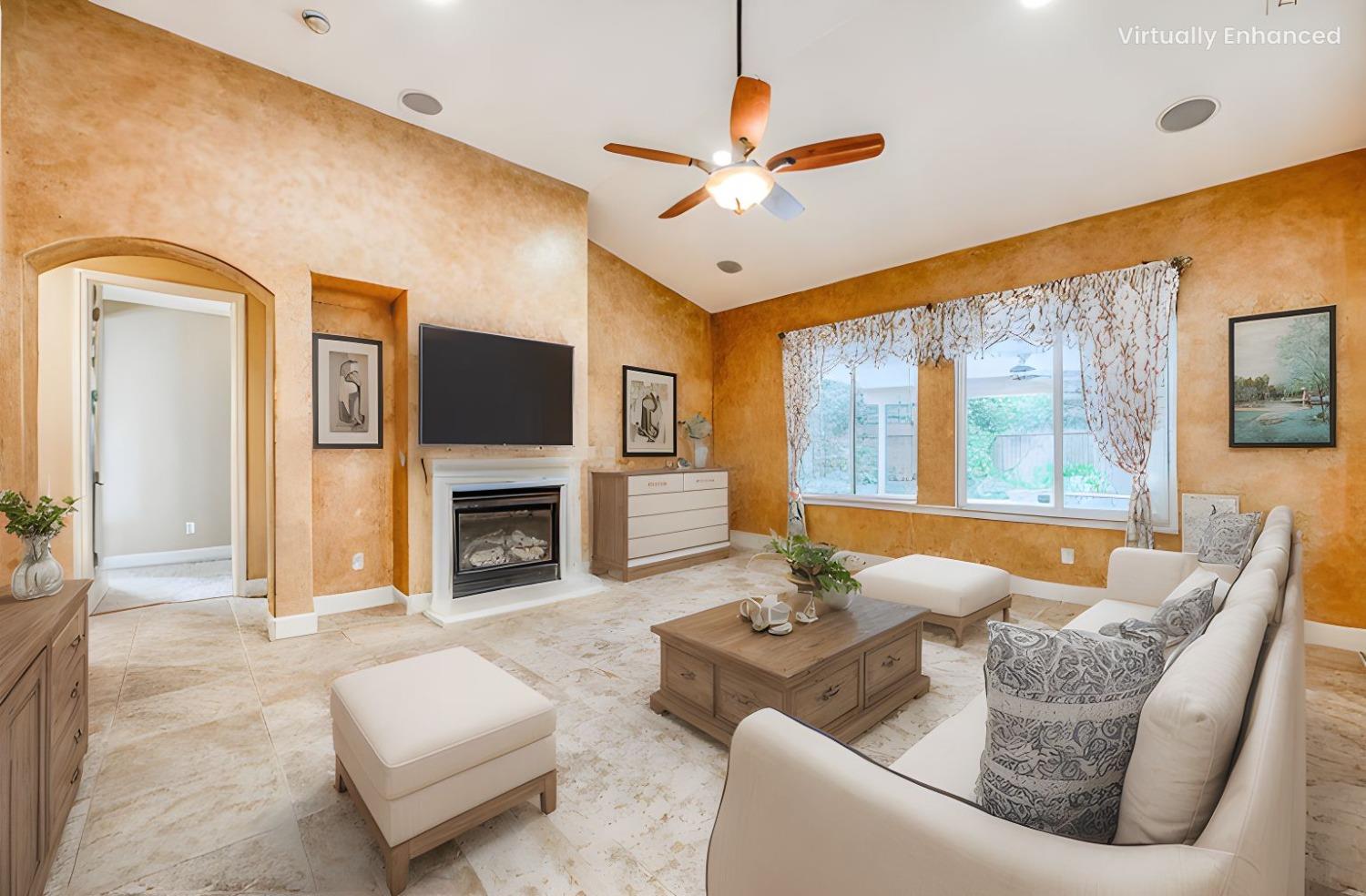 2267 Graybark Avenue Clovis, CA 93619 - Photo 8 of 42 a living room with fireplace furniture and a large window