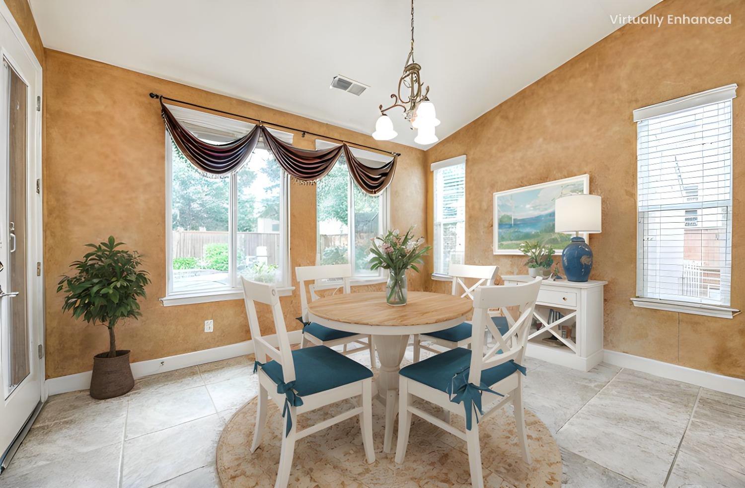 2267 Graybark Avenue Clovis, CA 93619 - Photo 10 of 42 a dining room with furniture and window
