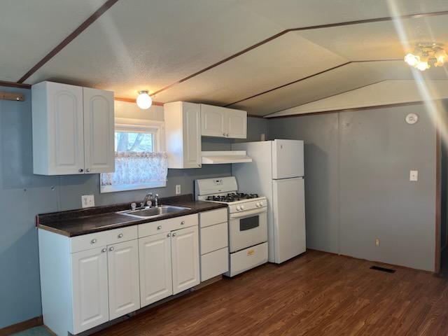 9 Miller Street Latrobe, PA 15650 - Photo 14 of 14 a kitchen with granite countertop white cabinets and white appliances