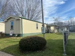 a view of a back yard of the house