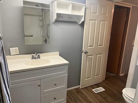 9 Miller Street Latrobe, PA 15650 - Photo 8 of 14 a bathroom with a sink a toilet and a mirror