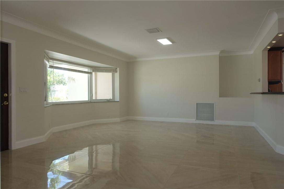 1311 Southwest 12th Avenue Boca Raton, FL 33486 - Photo 11 of 66 a view of an empty room with a window