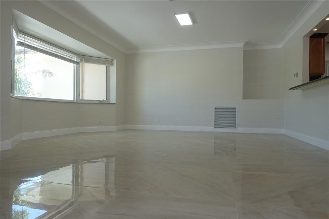 1311 Southwest 12th Avenue Boca Raton, FL 33486 - Photo 12 of 66 a view of a livingroom with an empty space and a window