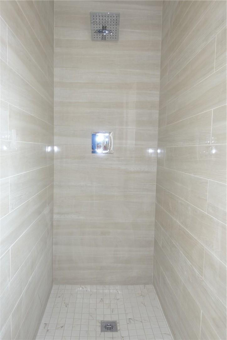 1311 Southwest 12th Avenue Boca Raton, FL 33486 - Photo 19 of 66 a bathroom with a shower