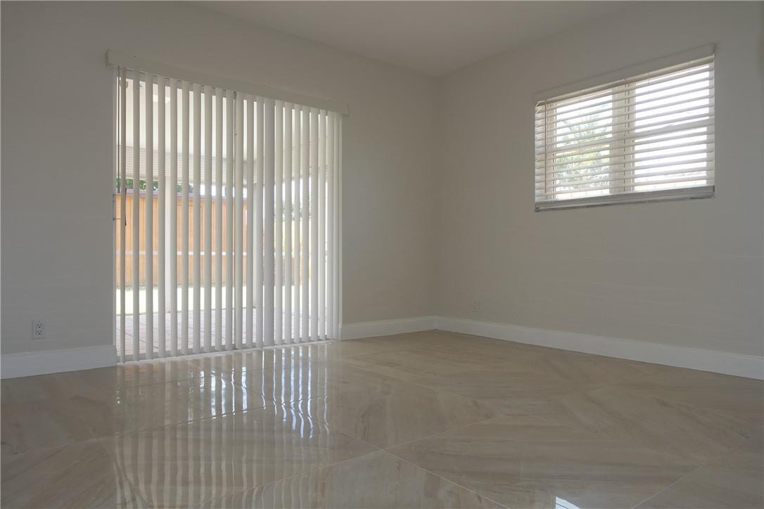 1311 Southwest 12th Avenue Boca Raton, FL 33486 - Photo 23 of 66 an empty room with a window