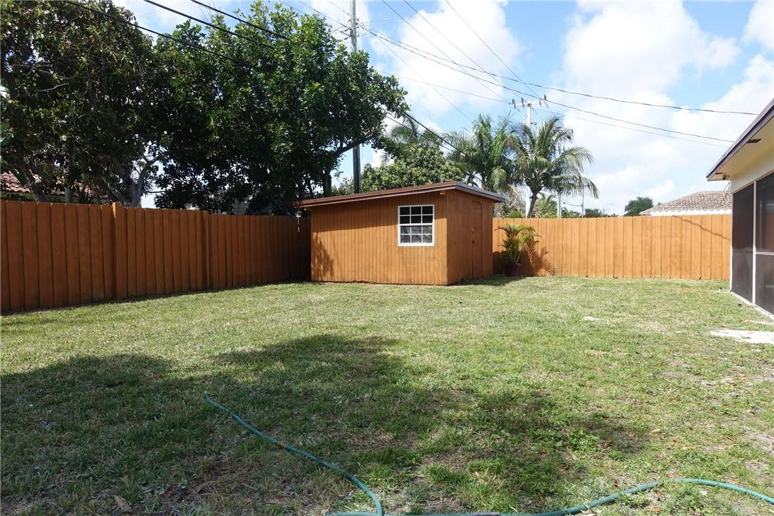 1311 Southwest 12th Avenue Boca Raton, FL 33486 - Photo 31 of 66 a view of backyard with tree