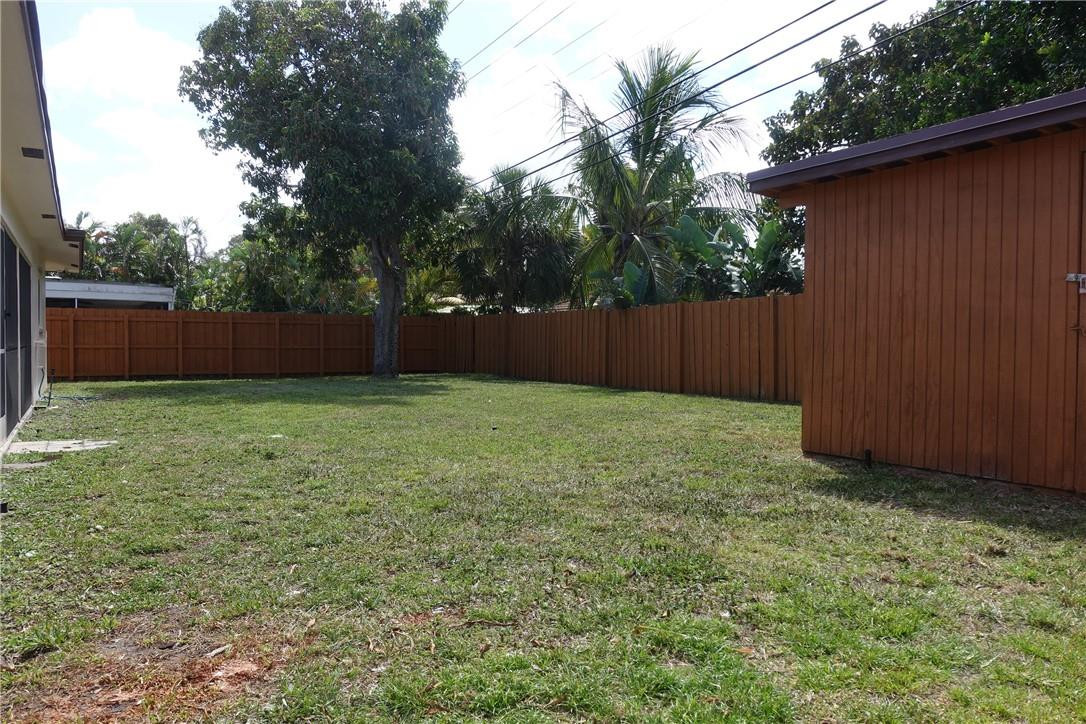 1311 Southwest 12th Avenue Boca Raton, FL 33486 - Photo 34 of 66 a view of backyard with green space