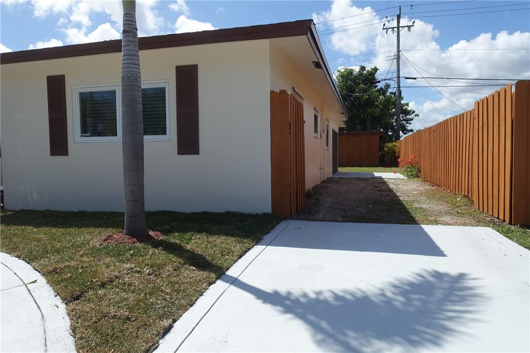 1311 Southwest 12th Avenue Boca Raton, FL 33486 - Photo 35 of 66 a view of a backyard of the house
