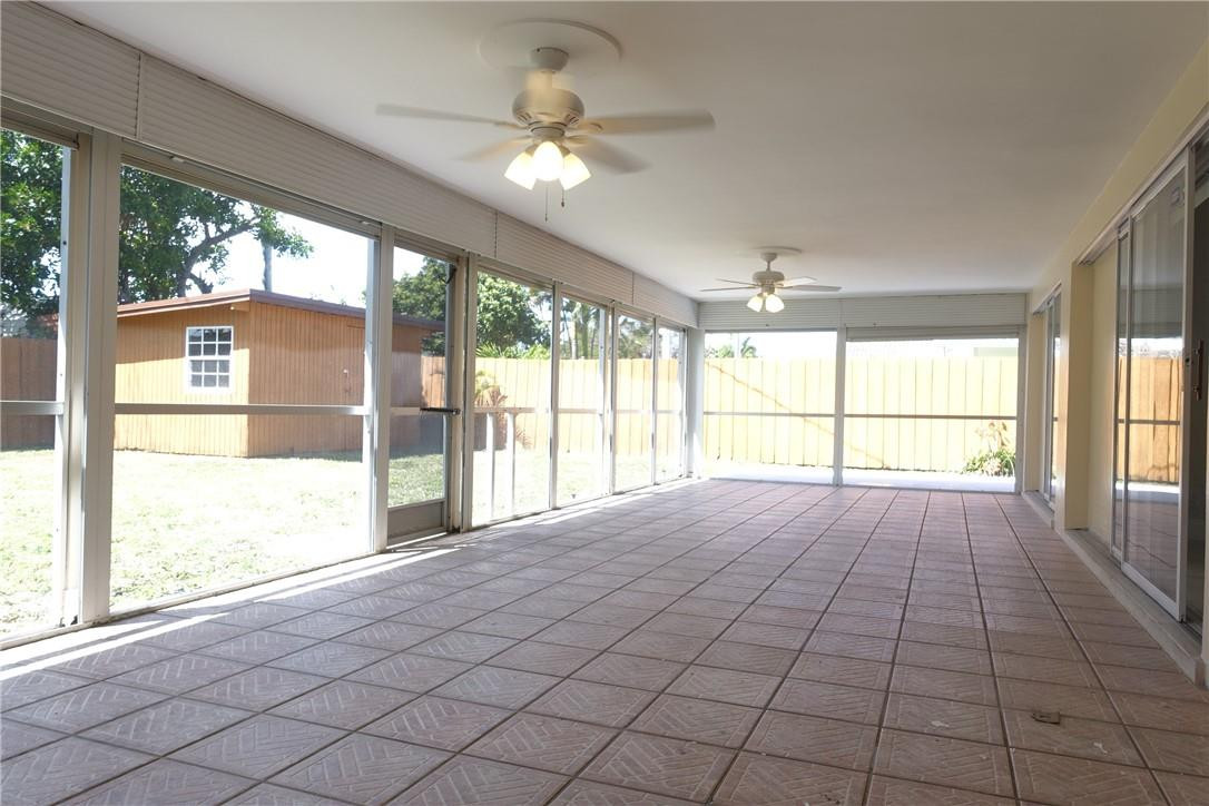 1311 Southwest 12th Avenue Boca Raton, FL 33486 - Photo 38 of 66 a view of an empty room with a large window
