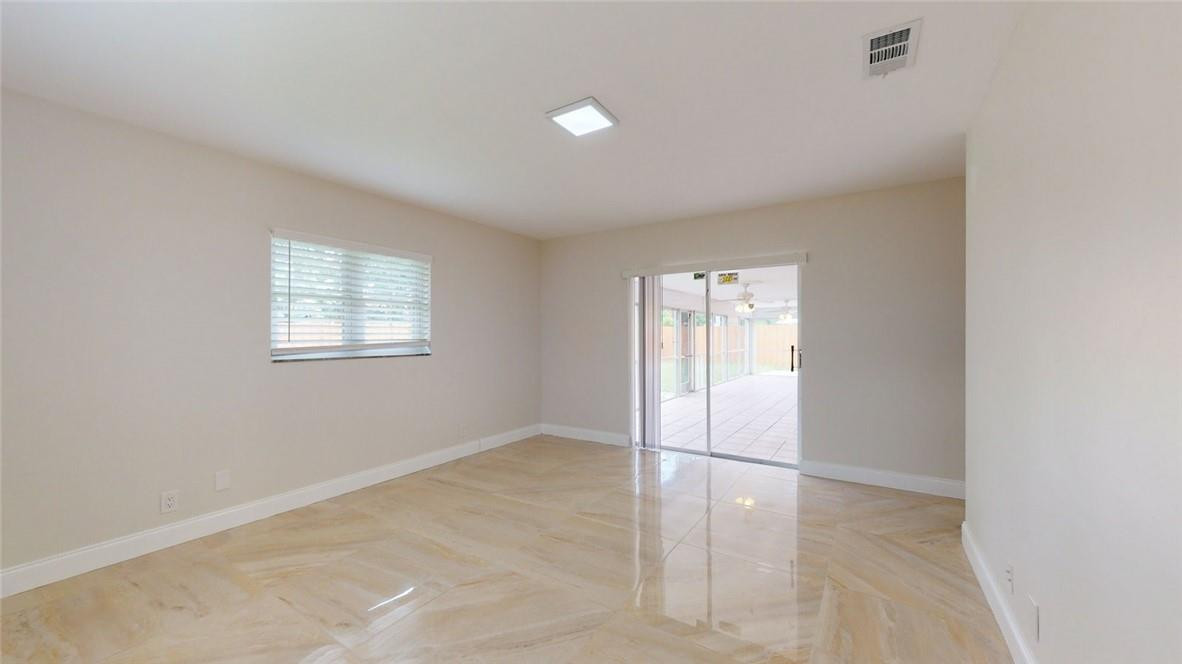 1311 Southwest 12th Avenue Boca Raton, FL 33486 - Photo 55 of 66 a view of an empty room with a window