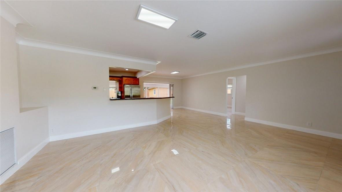 1311 Southwest 12th Avenue Boca Raton, FL 33486 - Photo 61 of 66 a view of a kitchen with a sink and a window
