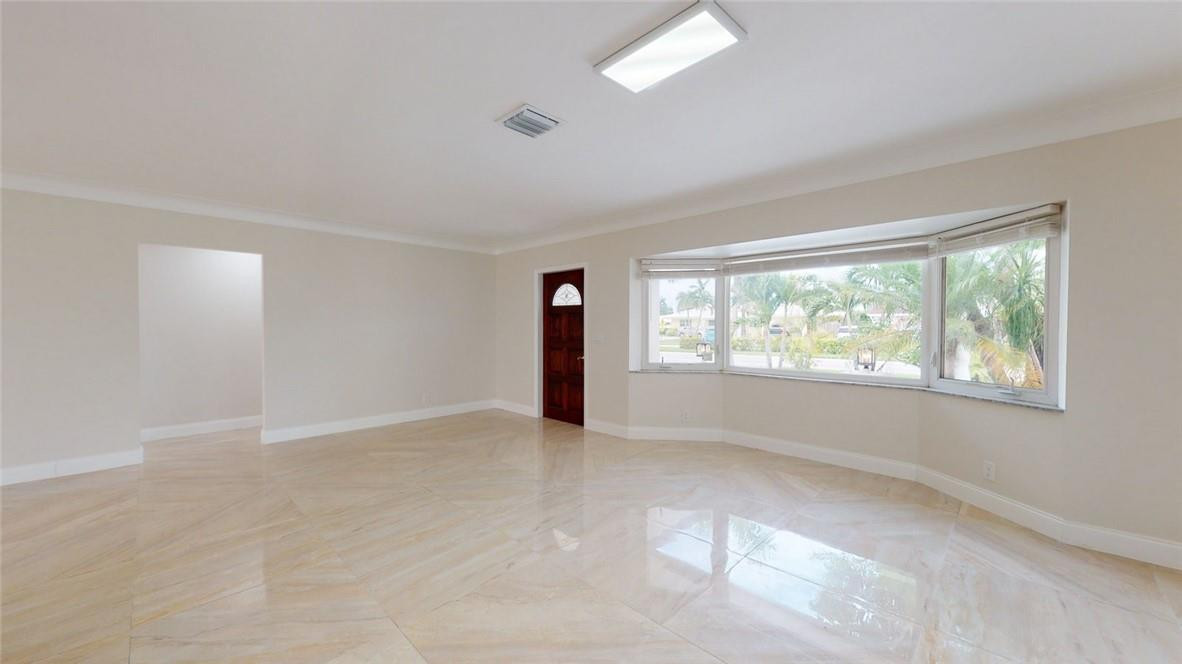 1311 Southwest 12th Avenue Boca Raton, FL 33486 - Photo 62 of 66 a view of an empty room with a window