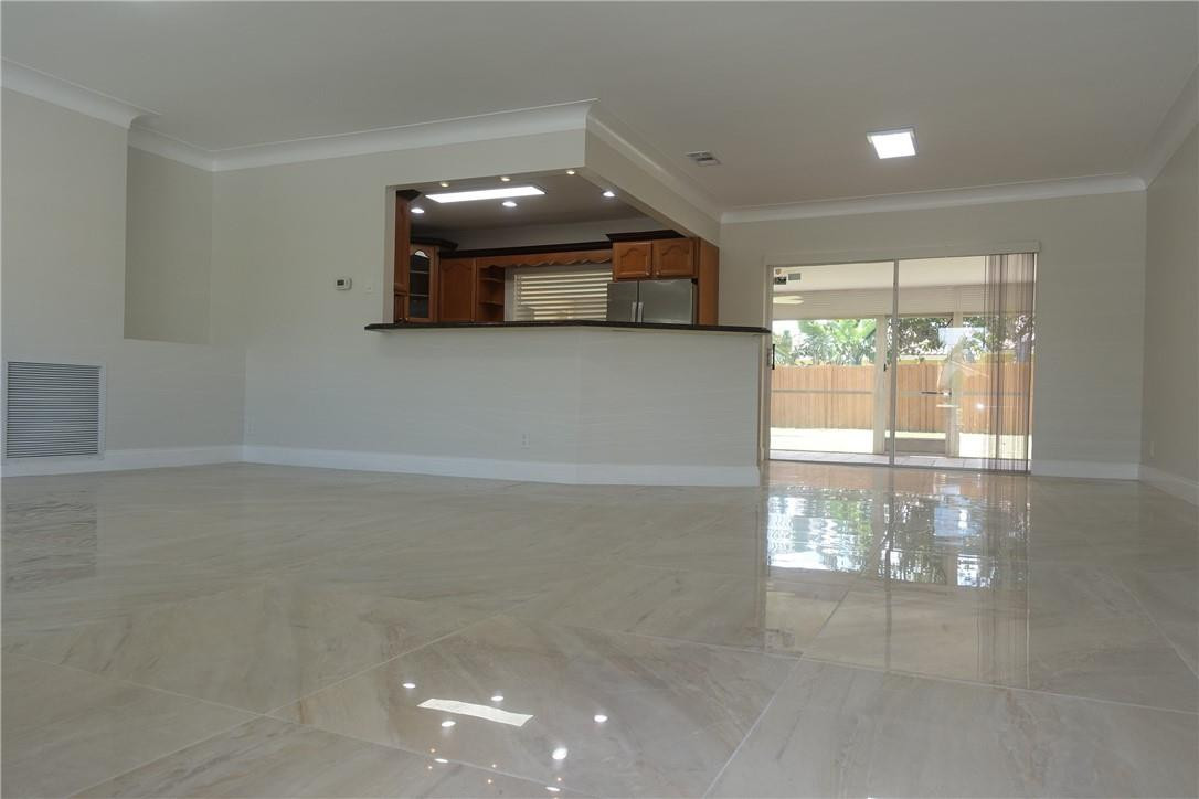 1311 Southwest 12th Avenue Boca Raton, FL 33486 - Photo 8 of 66 a view of a room with an empty space and window
