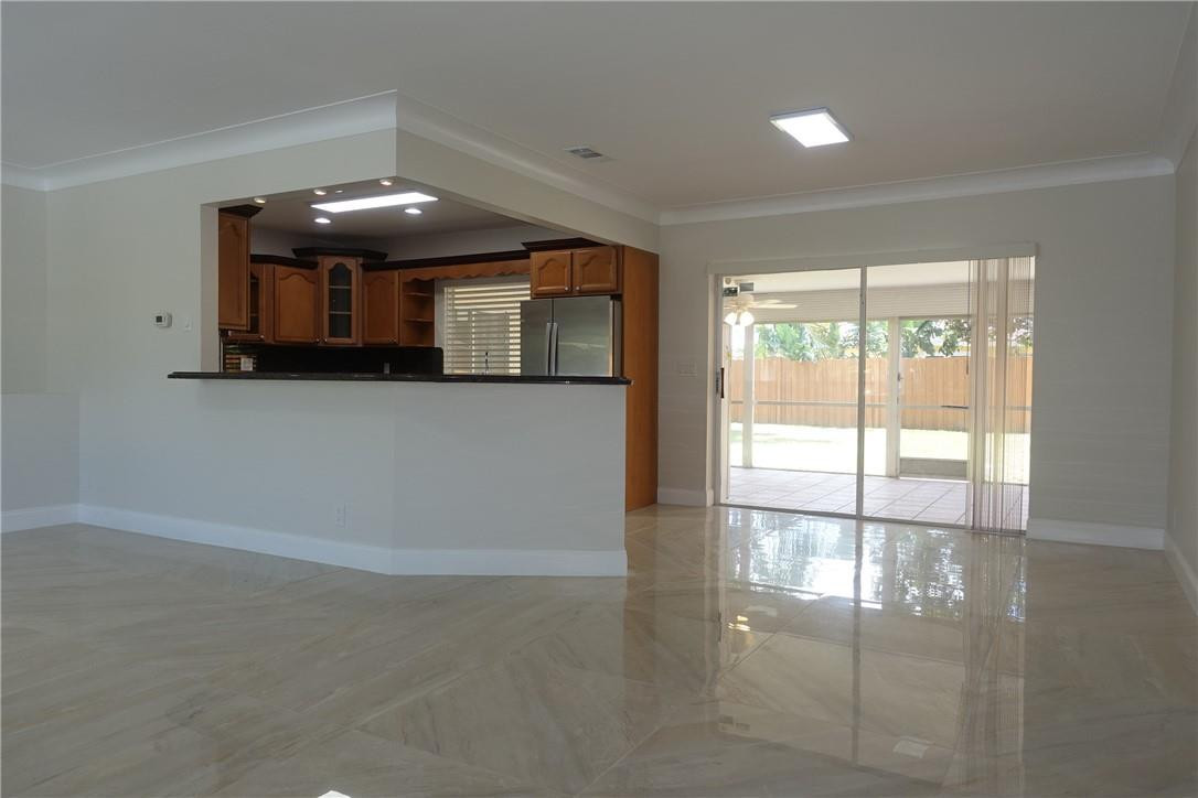 1311 Southwest 12th Avenue Boca Raton, FL 33486 - Photo 10 of 66 a view of an empty room with a window
