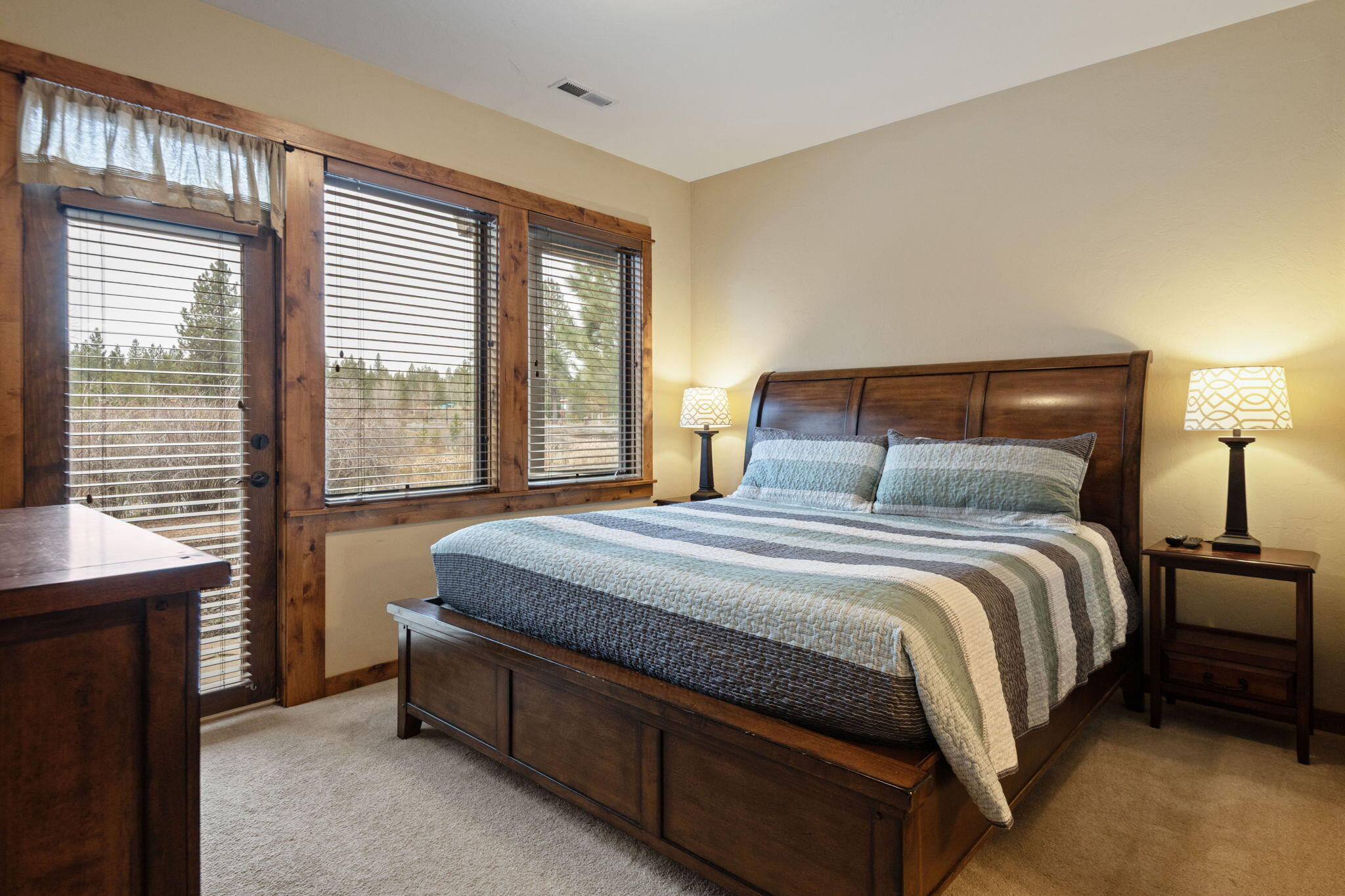 56508 Dancing Rock Loop, Unit 22 Bend, OR 97707 - Photo 31 of 69 a bedroom with a bed and window