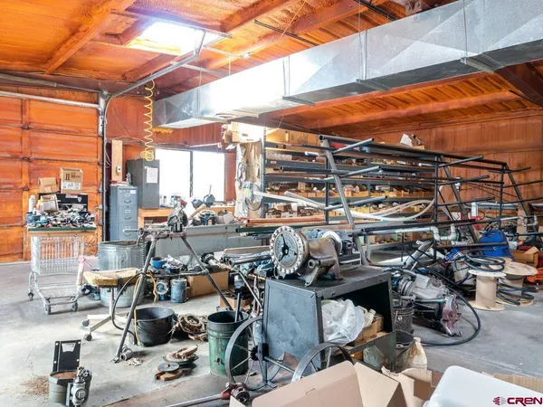 a terrace with a table and chairs