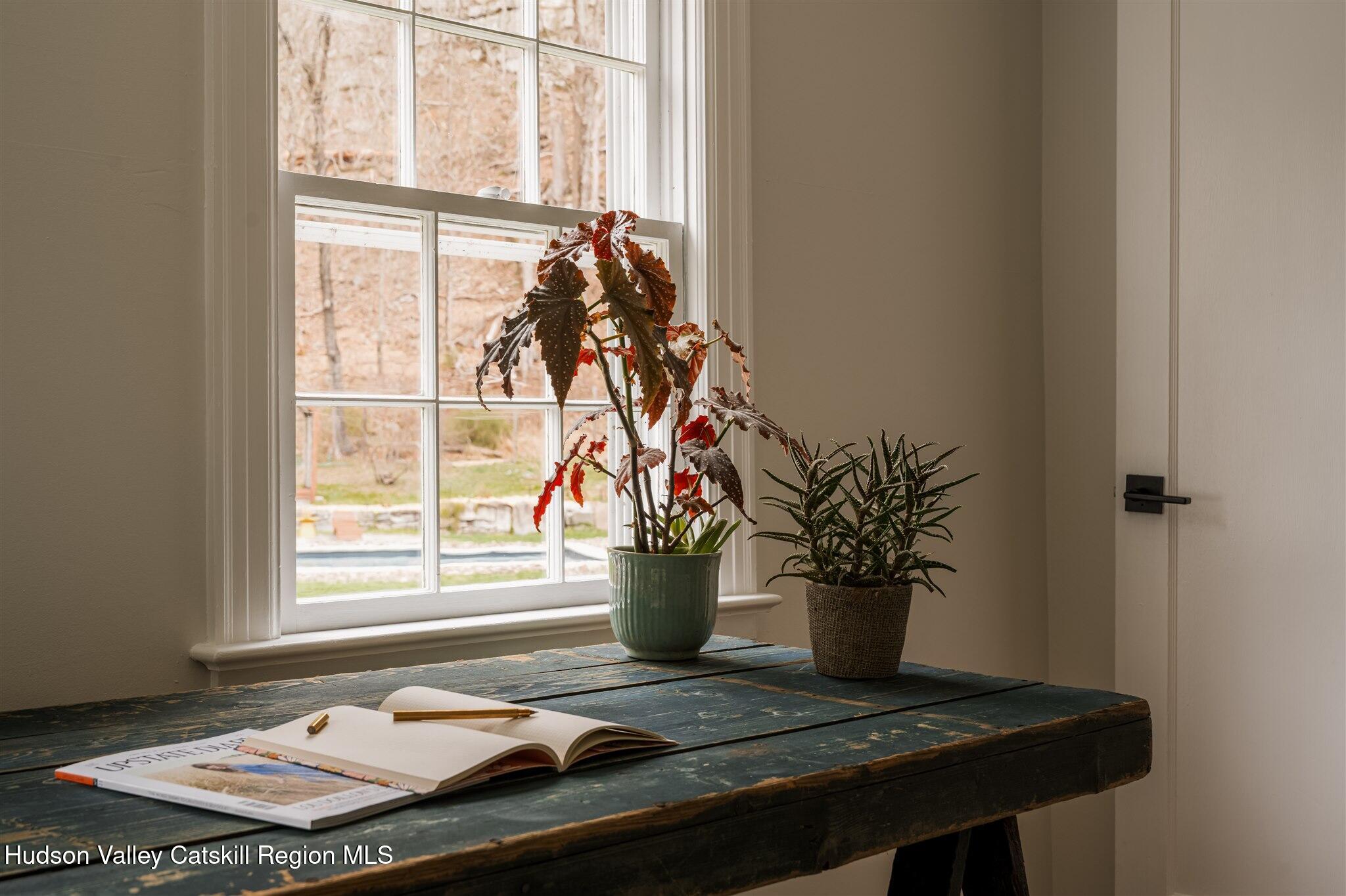15 Dashville Road New Paltz, NY 12561 - Photo 25 of 38 a view of a vase of flowers sitting on a table