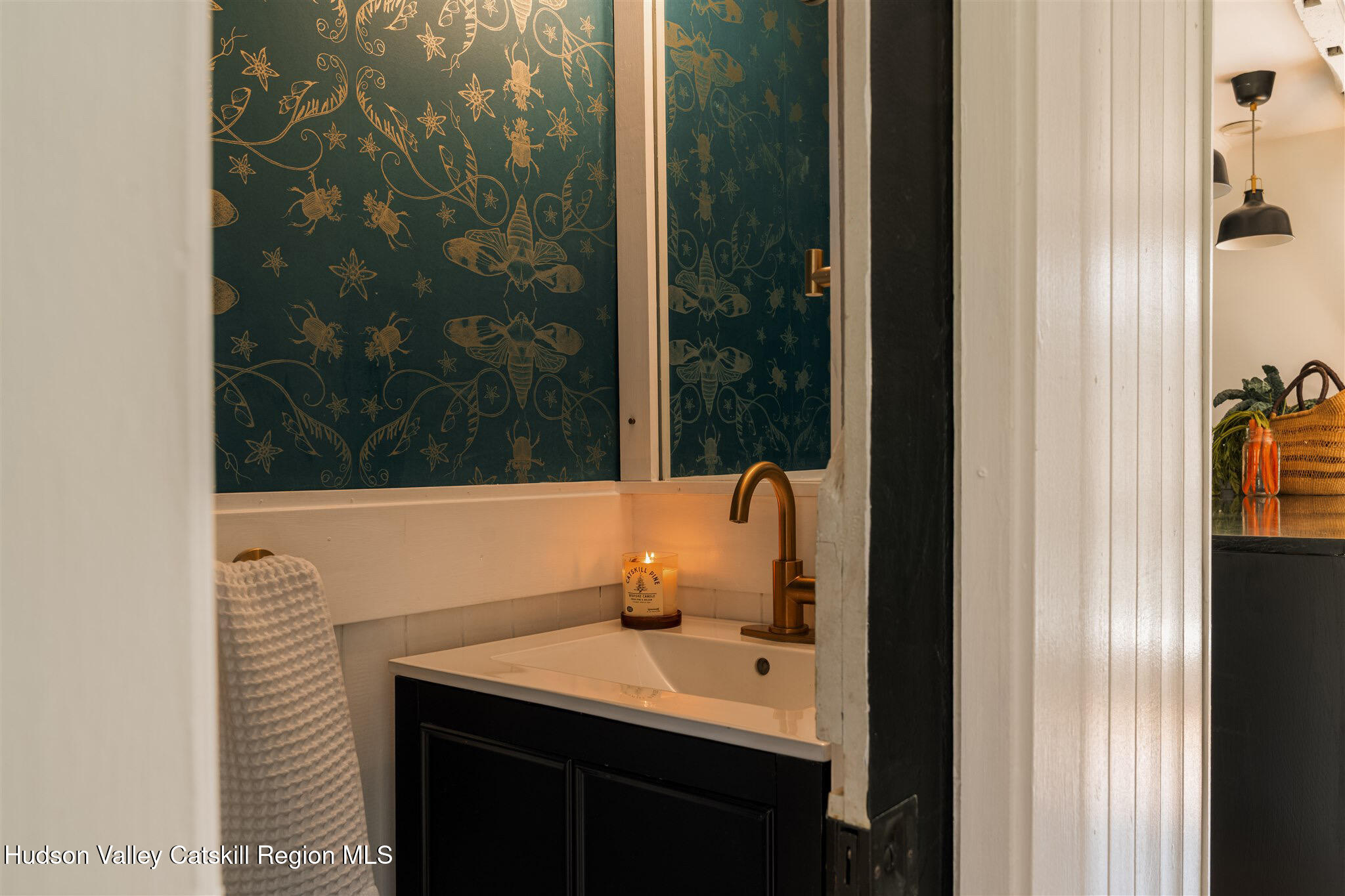 15 Dashville Road New Paltz, NY 12561 - Photo 10 of 38 a bathroom with a sink and mirror
