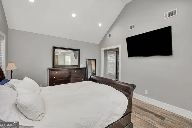 a bathroom with 2 sink and a mirror