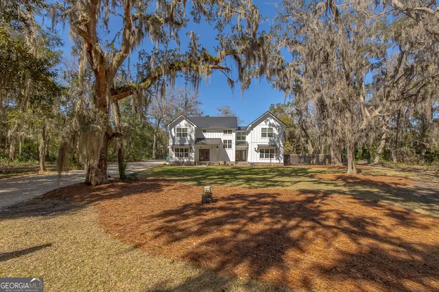 a view of a workspace with furniture