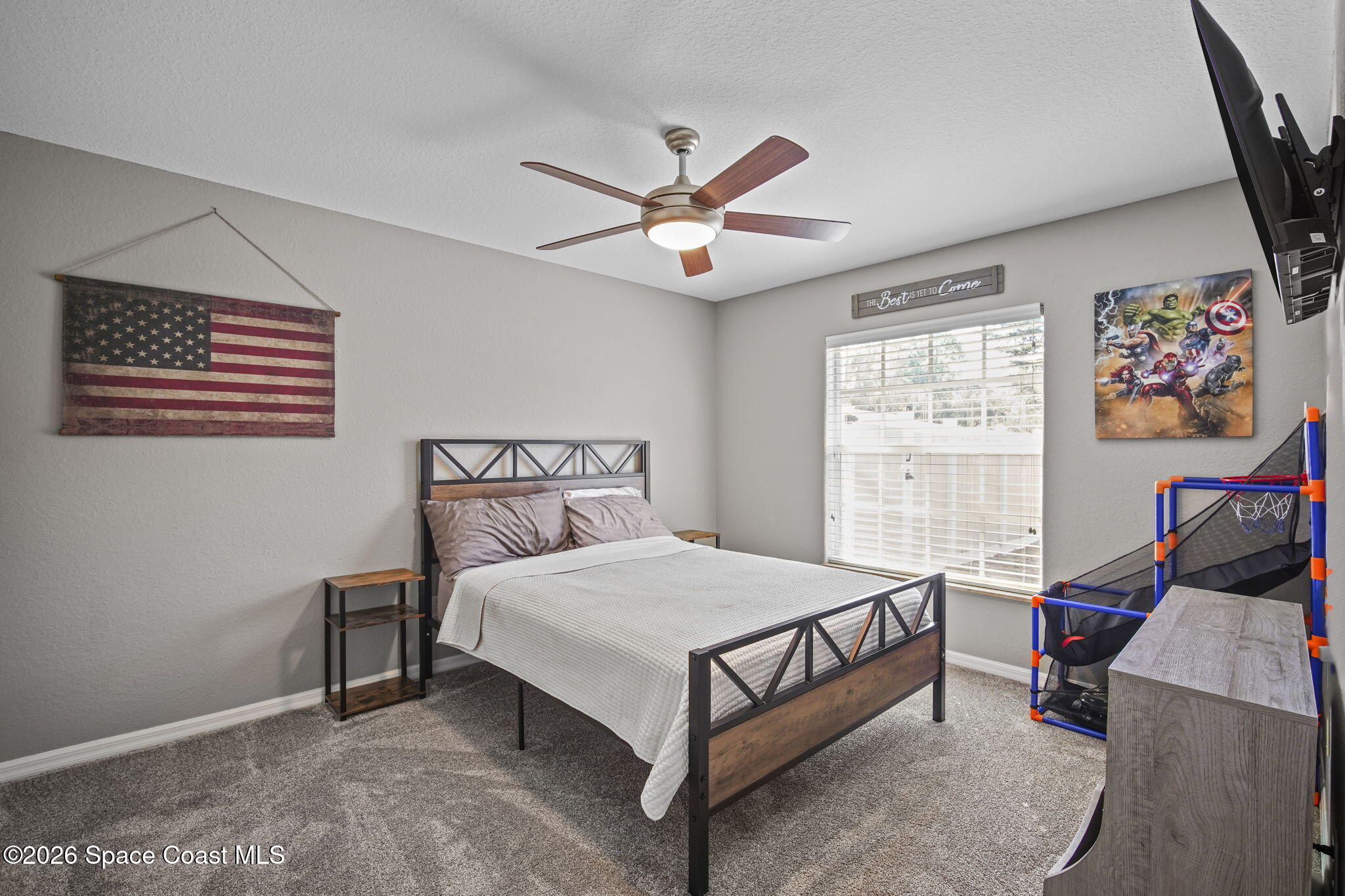 1845 Turpentine Road Mims, FL 32754 - Photo 23 of 33 a bedroom with a bed and a window