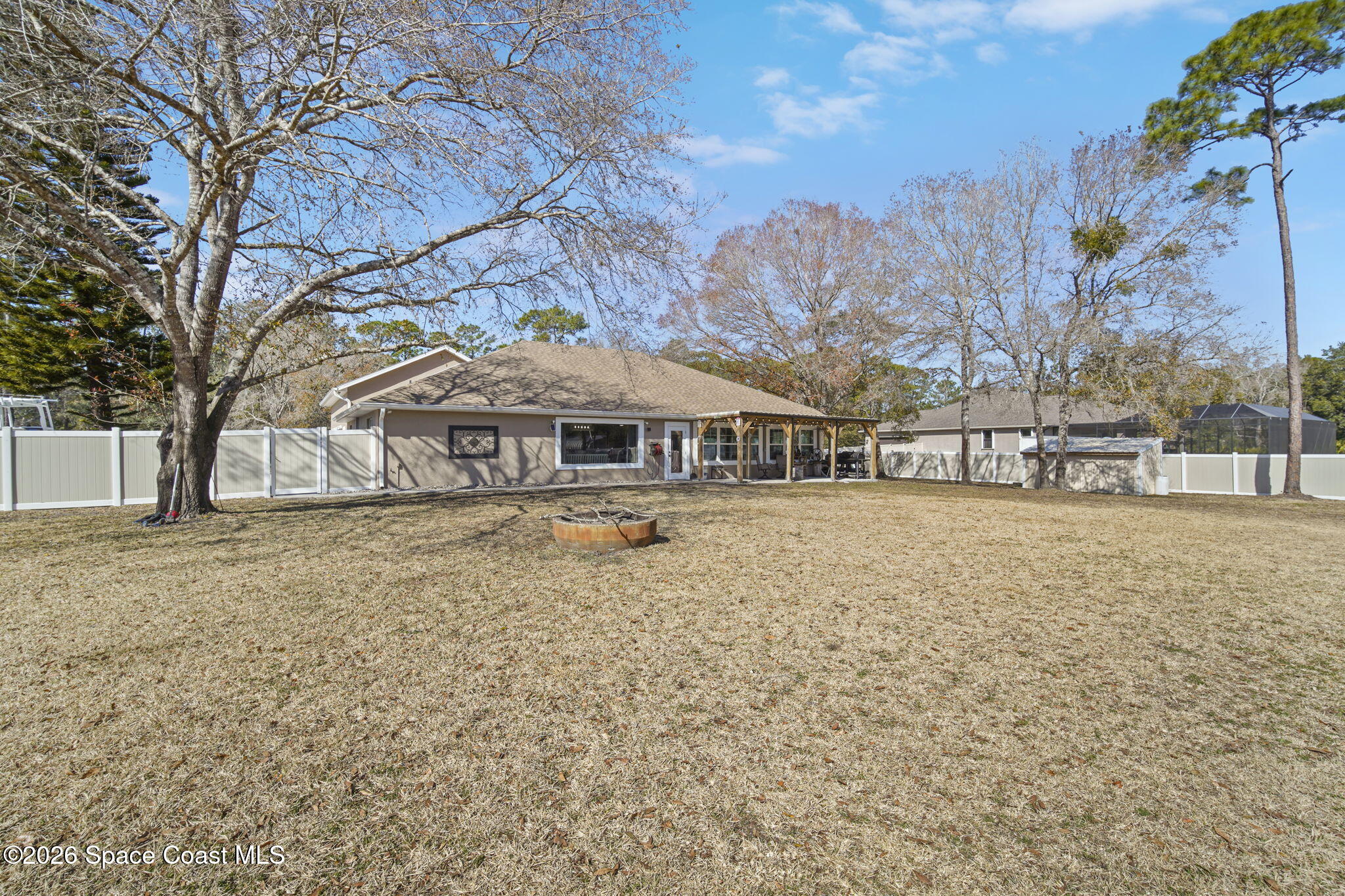 1845 Turpentine Road Mims, FL 32754 - Photo 27 of 33 a front view of a house with a yard